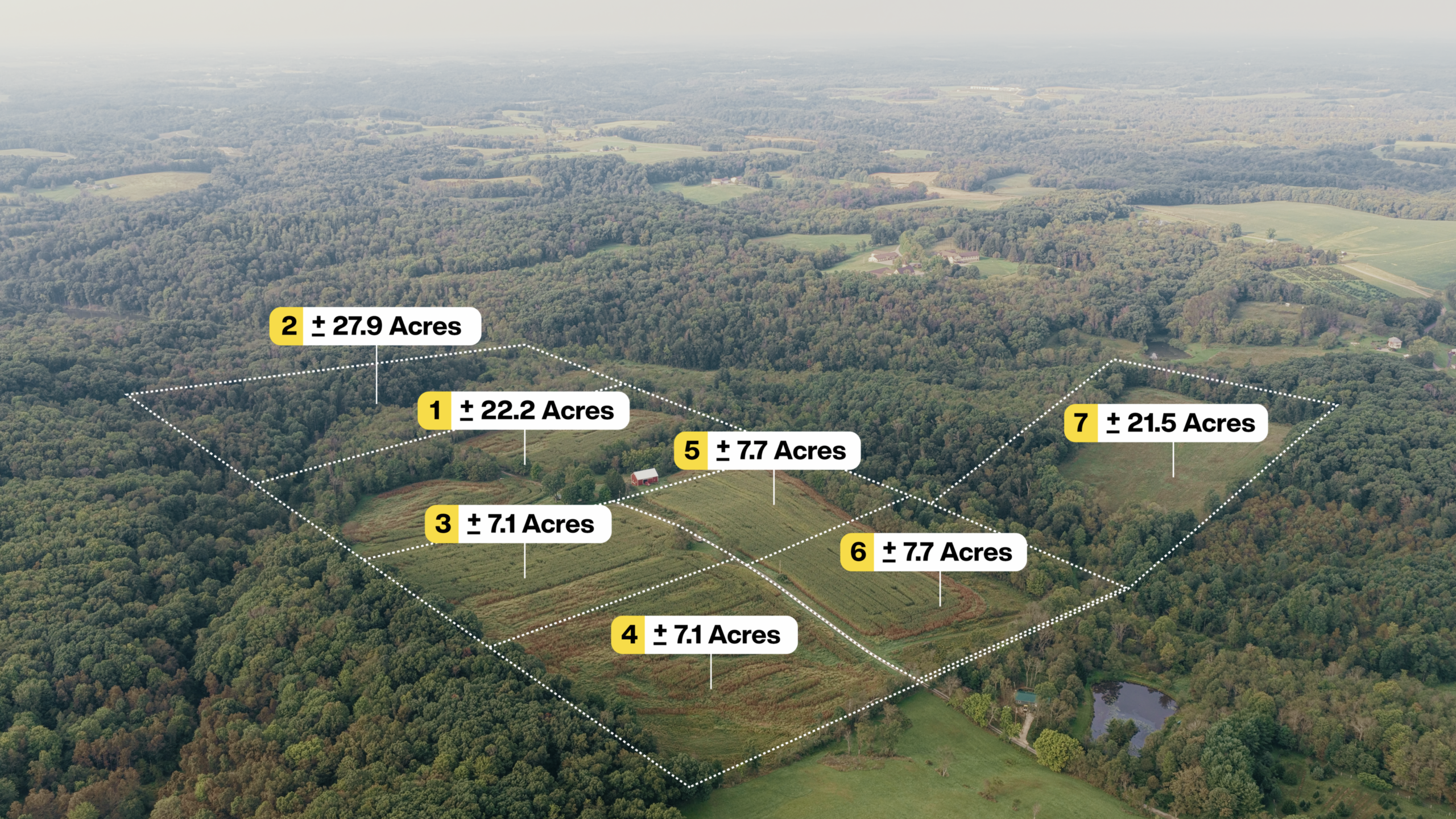 Aerial view of a 27.9-acre property with multiple land parcels outlined.